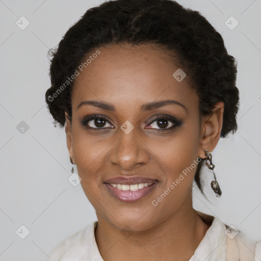 Joyful black young-adult female with medium  brown hair and brown eyes