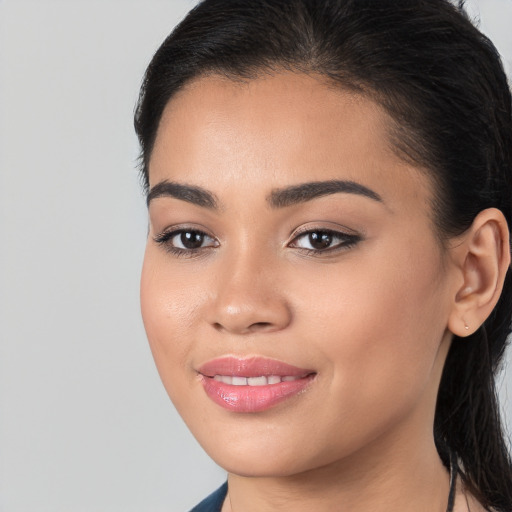 Joyful white young-adult female with medium  black hair and brown eyes