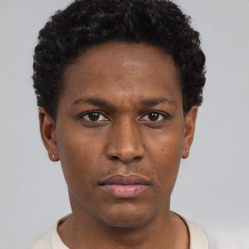Neutral black young-adult male with short  brown hair and brown eyes