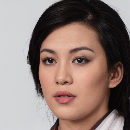 Neutral white young-adult female with medium  black hair and brown eyes