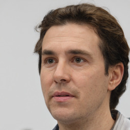 Neutral white adult male with short  brown hair and brown eyes