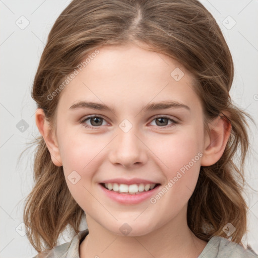 Joyful white child female with medium  brown hair and grey eyes