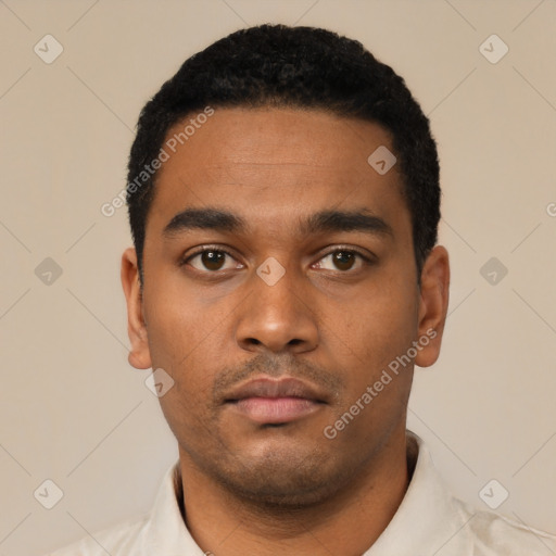 Neutral latino young-adult male with short  black hair and brown eyes