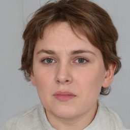 Neutral white young-adult female with medium  brown hair and grey eyes