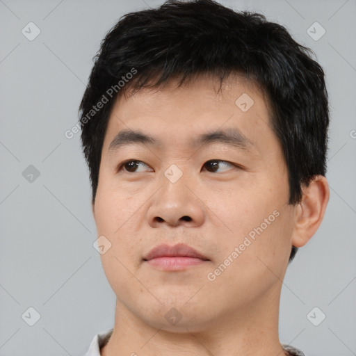 Neutral asian young-adult male with short  black hair and brown eyes