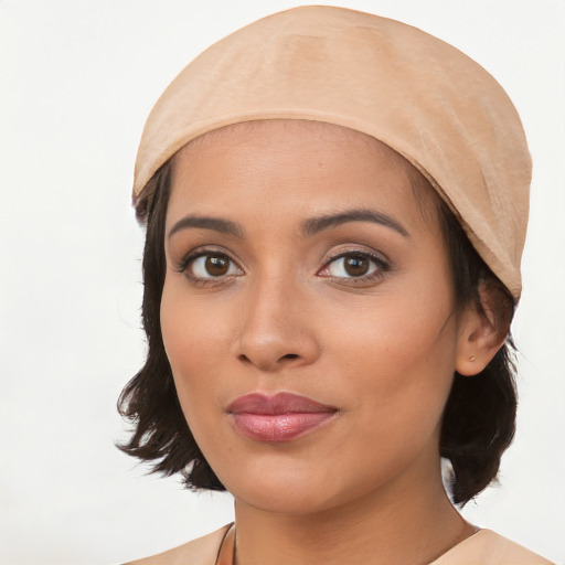 Joyful white young-adult female with medium  black hair and brown eyes