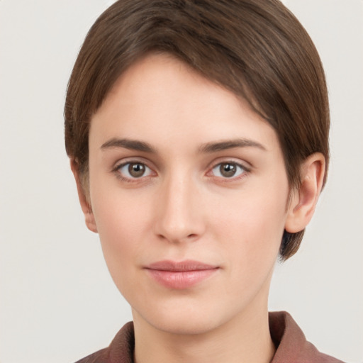 Neutral white young-adult female with short  brown hair and brown eyes