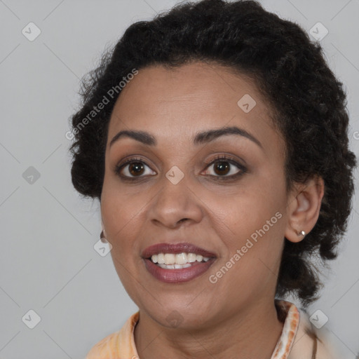 Joyful black young-adult female with medium  brown hair and brown eyes