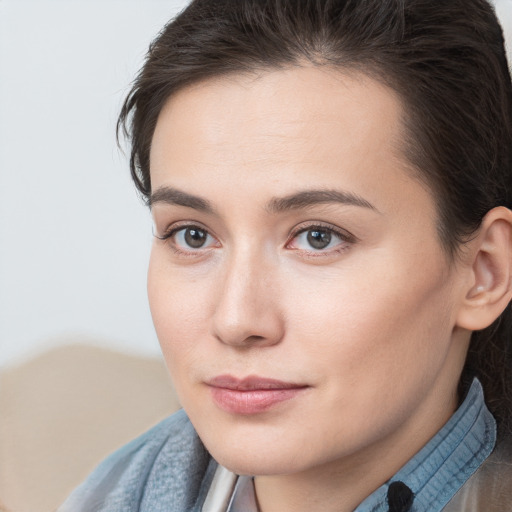 Neutral white young-adult female with short  brown hair and brown eyes