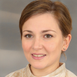 Joyful white young-adult female with medium  brown hair and brown eyes