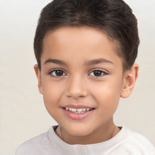 Joyful white child female with short  brown hair and brown eyes