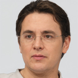 Neutral white adult male with short  brown hair and brown eyes