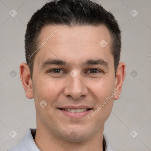 Joyful white young-adult male with short  brown hair and brown eyes