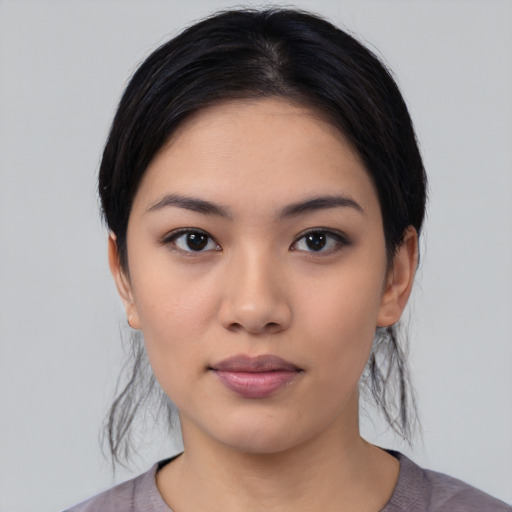 Neutral asian young-adult female with medium  black hair and brown eyes