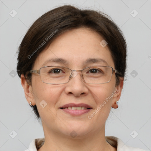 Joyful white adult female with short  brown hair and brown eyes