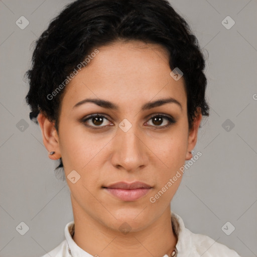 Joyful latino young-adult female with short  brown hair and brown eyes