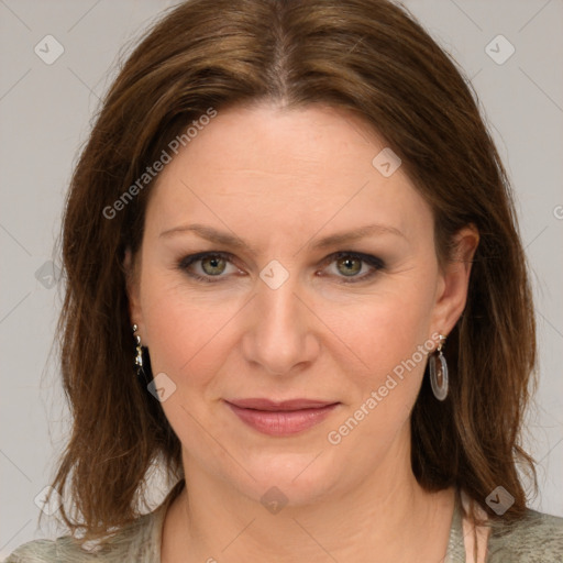 Joyful white young-adult female with medium  brown hair and green eyes