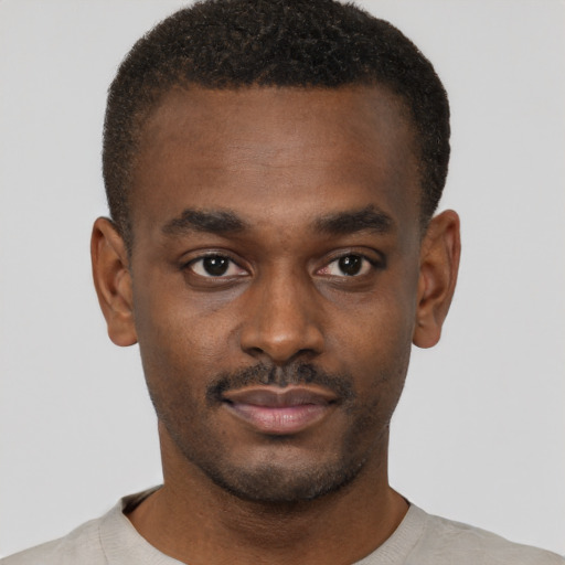 Neutral black young-adult male with short  brown hair and brown eyes