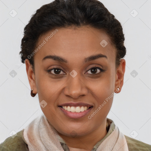 Joyful latino young-adult female with short  brown hair and brown eyes