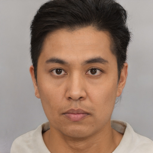 Neutral asian young-adult male with short  black hair and brown eyes