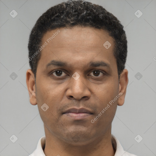 Neutral latino young-adult male with short  brown hair and brown eyes