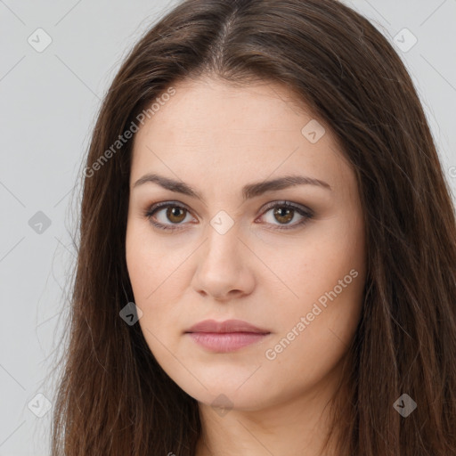 Neutral white young-adult female with long  brown hair and brown eyes