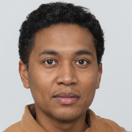 Neutral black young-adult male with short  brown hair and brown eyes