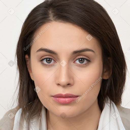 Neutral white young-adult female with medium  brown hair and brown eyes