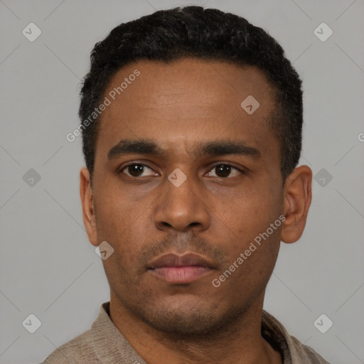 Neutral latino young-adult male with short  black hair and brown eyes