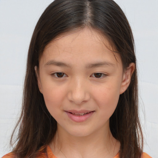 Joyful white child female with long  brown hair and brown eyes