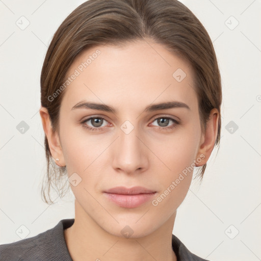 Neutral white young-adult female with medium  brown hair and brown eyes