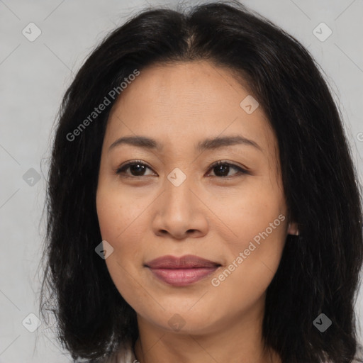 Joyful asian young-adult female with long  brown hair and brown eyes