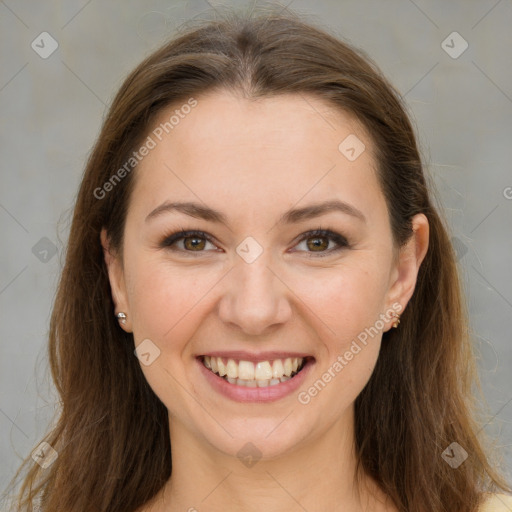 Joyful white young-adult female with medium  brown hair and green eyes