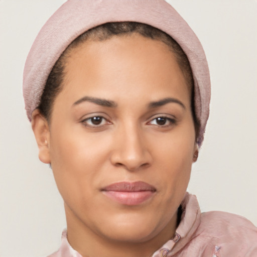 Joyful latino young-adult female with short  brown hair and brown eyes