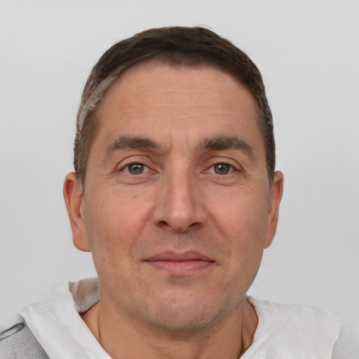 Neutral white adult male with short  brown hair and brown eyes