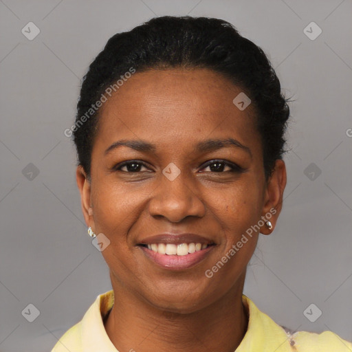 Joyful black young-adult female with short  black hair and brown eyes