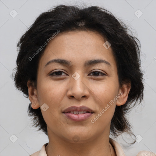 Joyful latino adult female with medium  brown hair and brown eyes