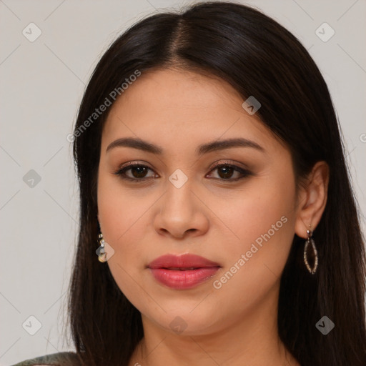 Joyful latino young-adult female with long  brown hair and brown eyes