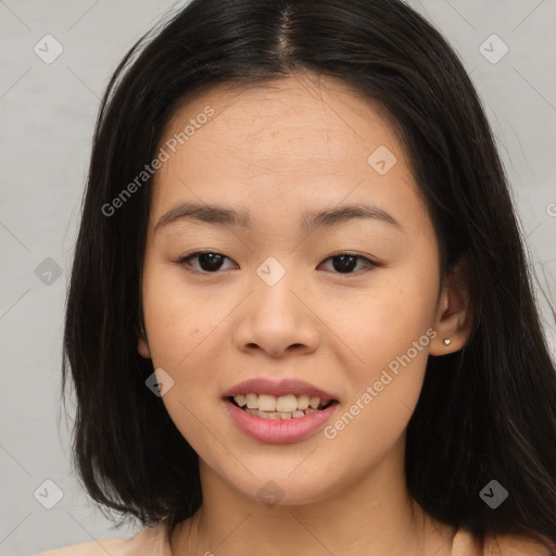 Joyful asian young-adult female with long  brown hair and brown eyes