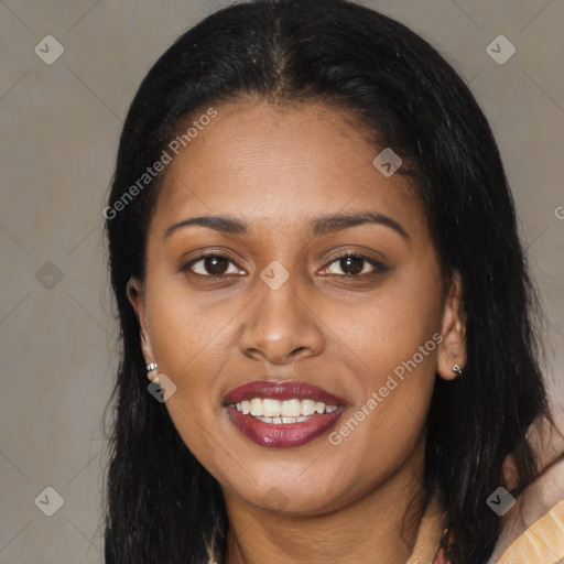 Joyful latino young-adult female with long  brown hair and brown eyes