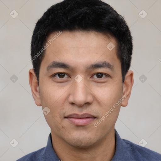 Joyful white young-adult male with short  black hair and brown eyes