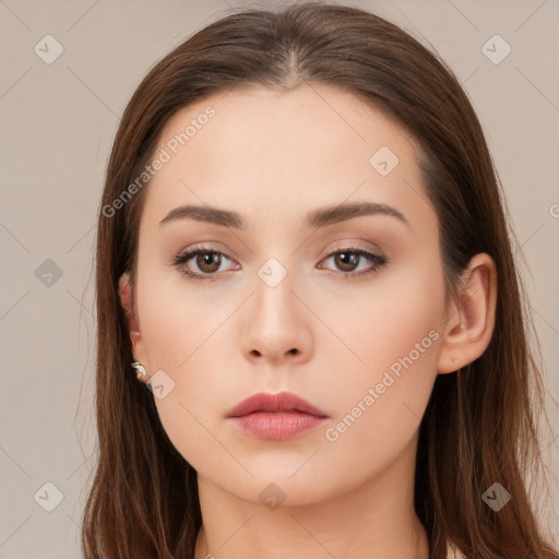 Neutral white young-adult female with long  brown hair and brown eyes