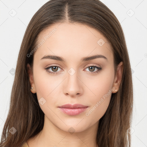 Neutral white young-adult female with long  brown hair and brown eyes