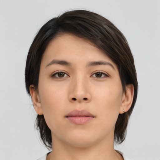 Neutral asian young-adult female with medium  brown hair and brown eyes