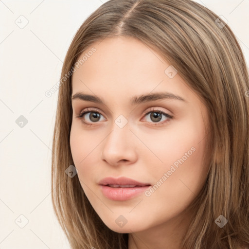 Neutral white young-adult female with long  brown hair and brown eyes