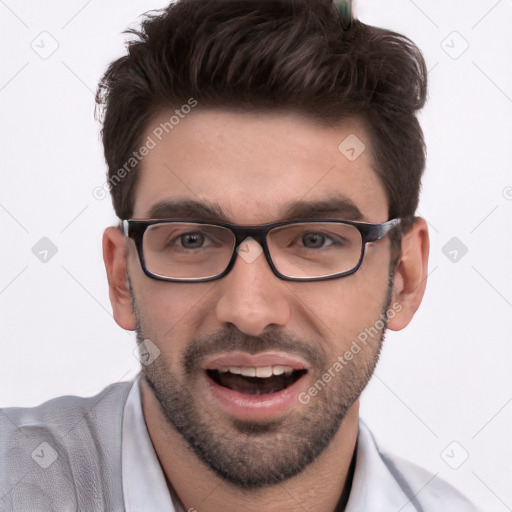 Joyful white young-adult male with short  black hair and brown eyes