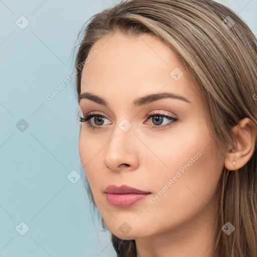 Neutral white young-adult female with long  brown hair and brown eyes