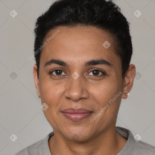 Joyful latino adult female with short  brown hair and brown eyes