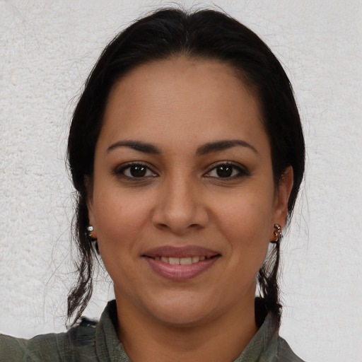 Joyful white young-adult female with medium  brown hair and brown eyes