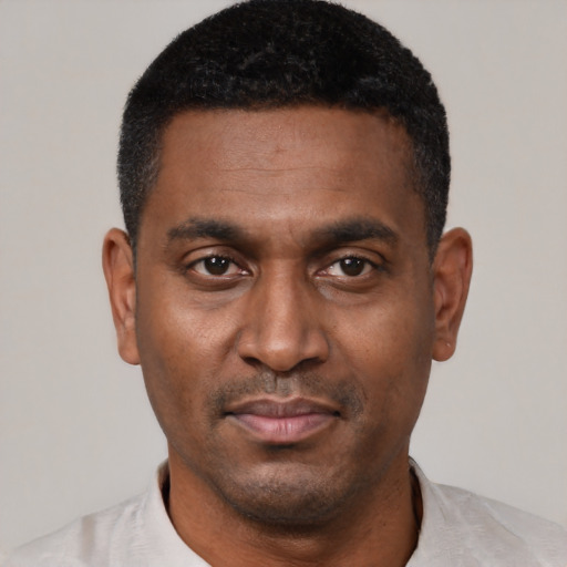 Neutral black young-adult male with short  black hair and brown eyes